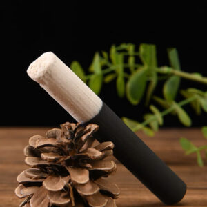 Moxa stick for the practice of moxibustion therapy.