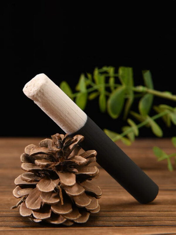 Moxa stick for the practice of moxibustion therapy.